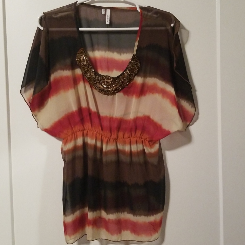 Sheer multi colored print top.